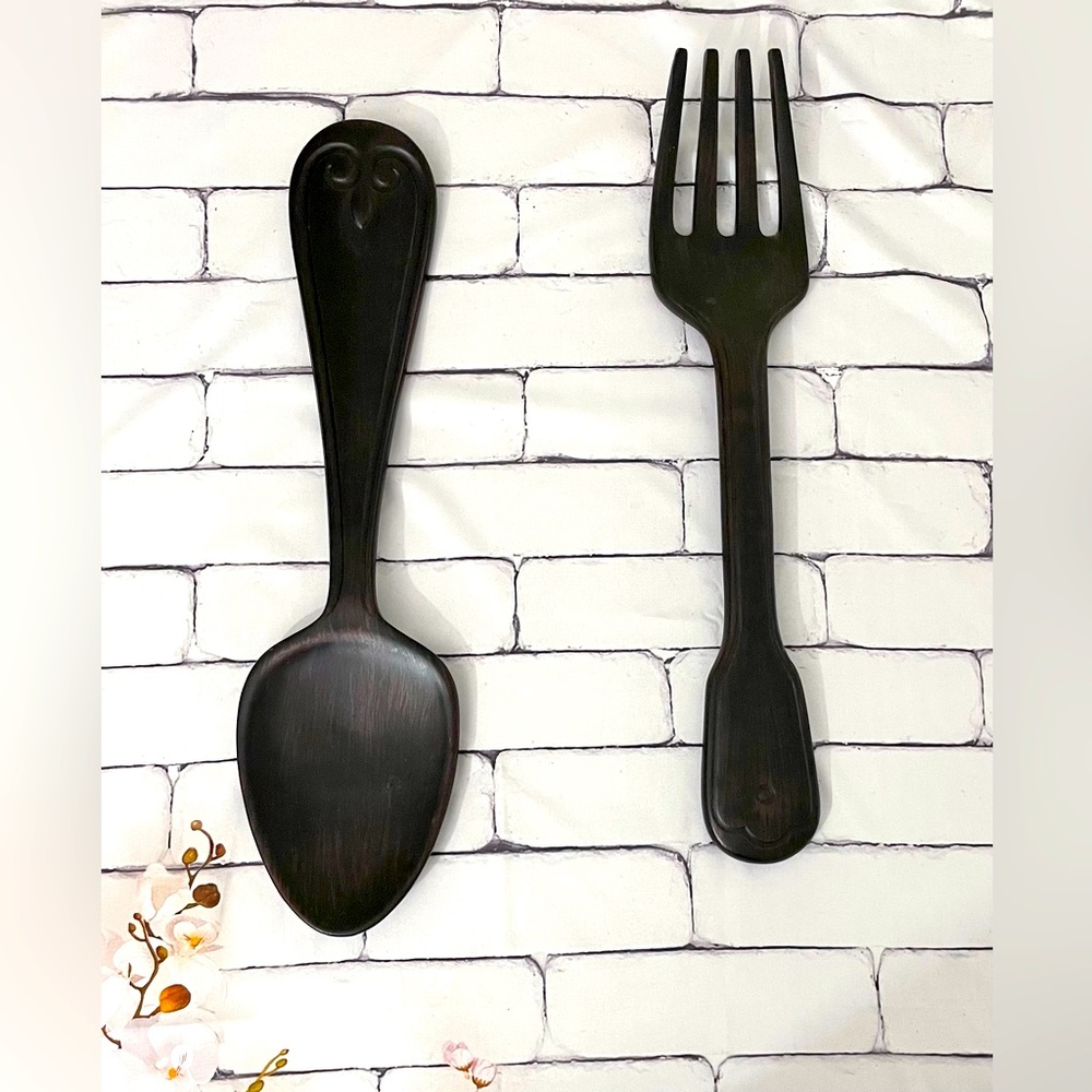 Large spoon and fork kitchen wooden decor.